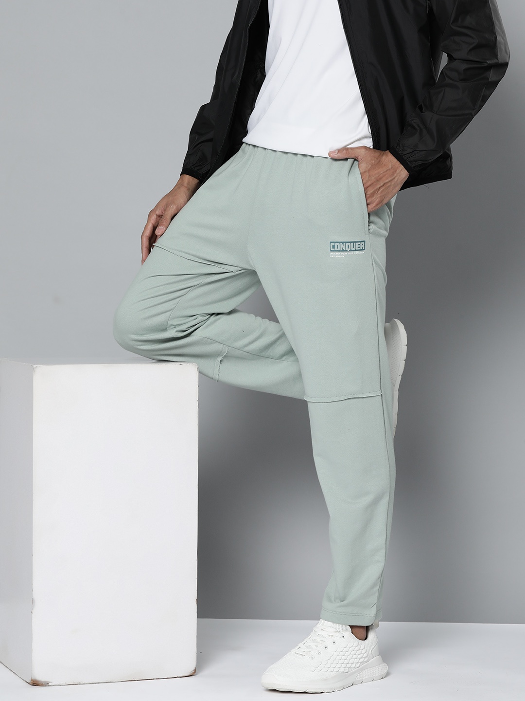 

HRX by Hrithik Roshan Men Solid Track Pants, Green