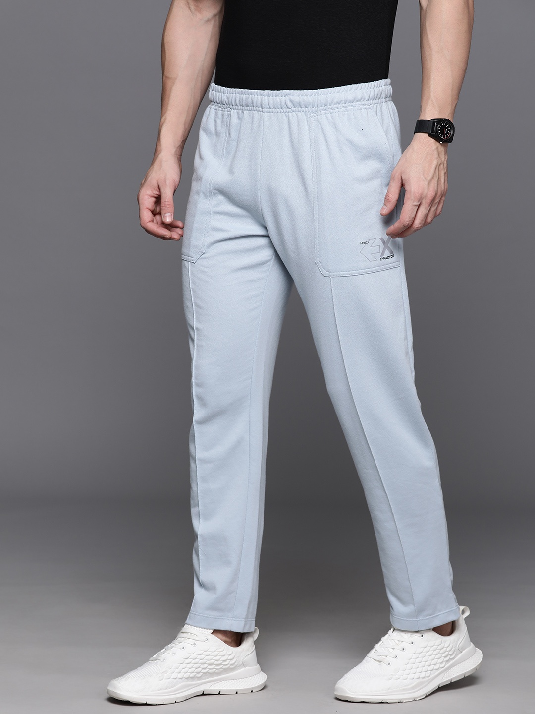 

HRX by Hrithik Roshan Men Mid-Rise Brand Logo Printed Detail Track Pants, Blue