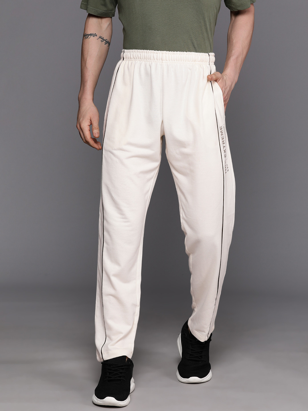 

HRX by Hrithik Roshan Men Brand Logo Printed Piping Detailed Lifestyle Jogger Trackpants, Off white