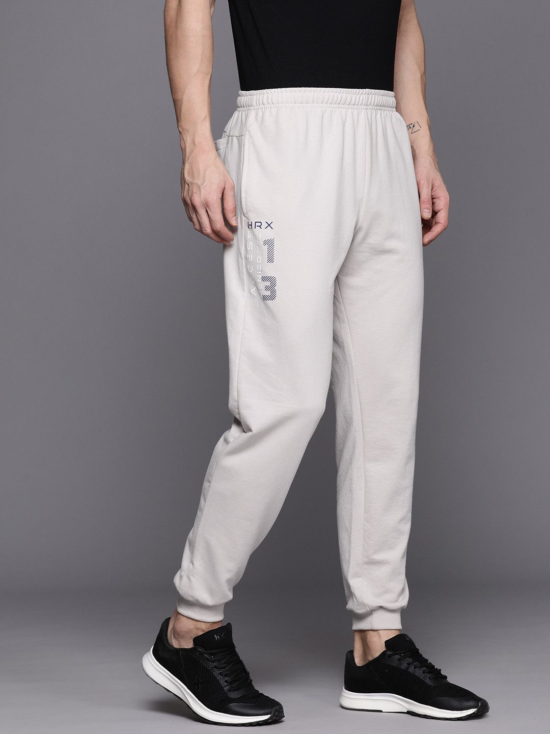 

HRX by Hrithik Roshan Men Brand Logo Printed Lifestyle Trackpants, Off white