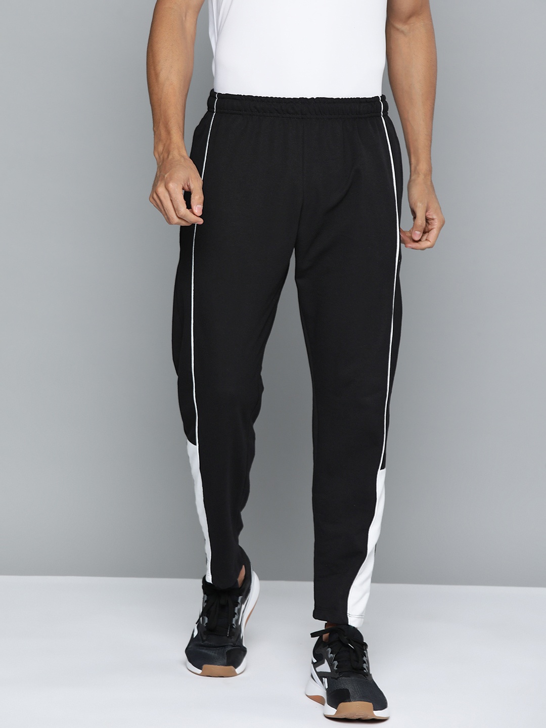 

HRX by Hrithik Roshan Men Solid Track Pants, Black
