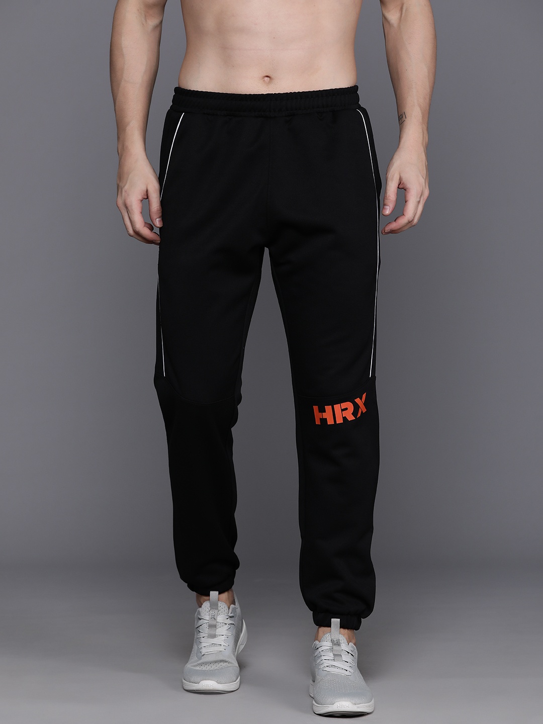 

HRX by Hrithik Roshan Men Rapid-Dry Typography Training Joggers With Reflective Elements, Black