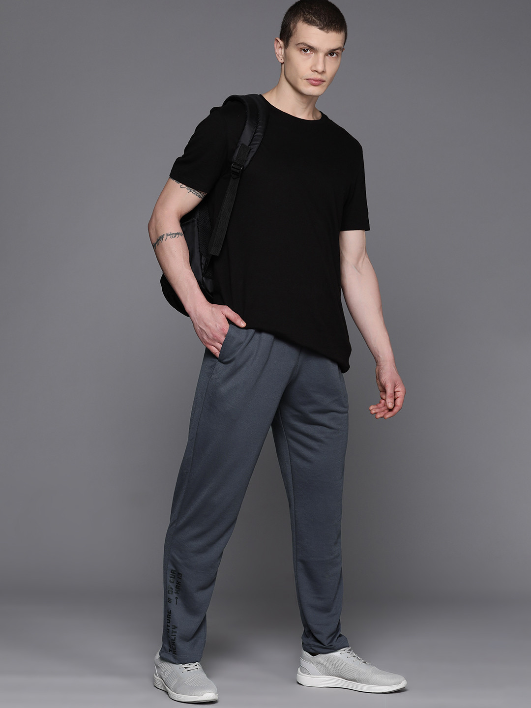 

HRX by Hrithik Roshan Men Solid Lifestyle Track Pants, Charcoal