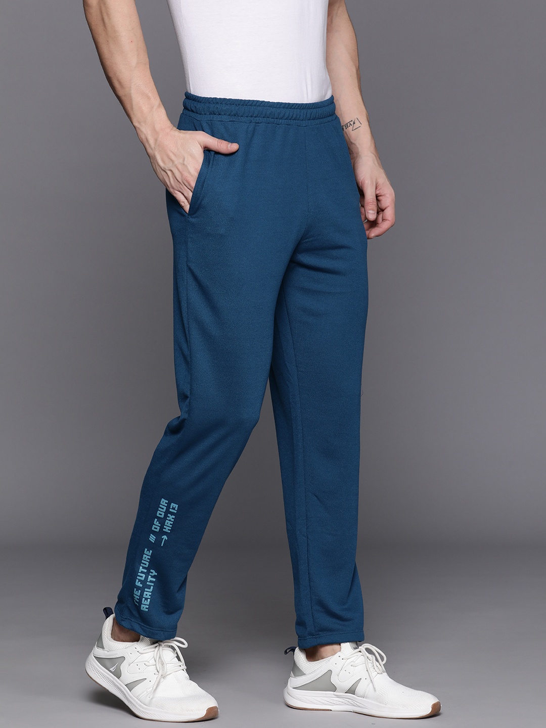 

HRX by Hrithik Roshan Men Solid Lifestyle Track Pants, Teal