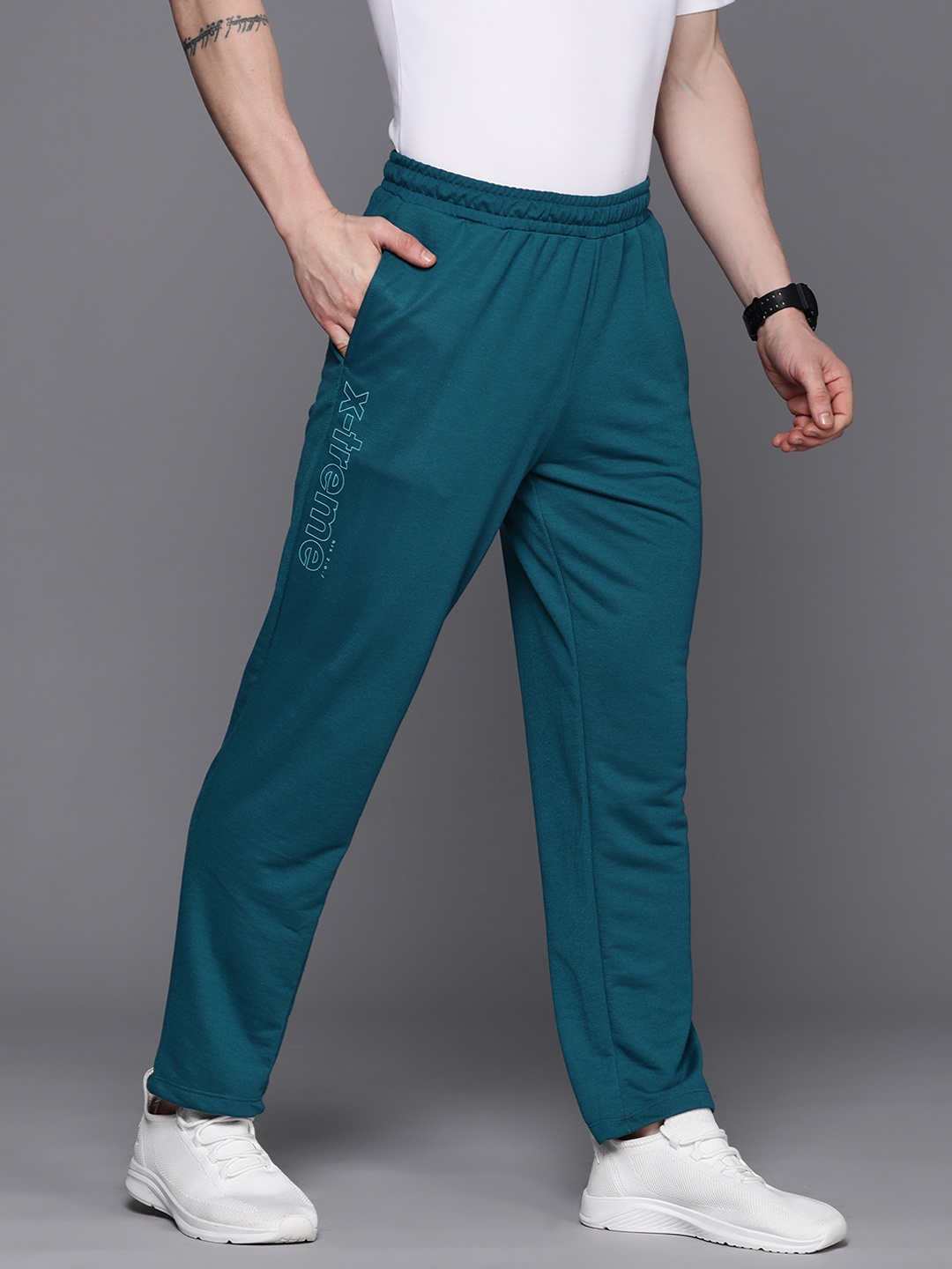 

HRX by Hrithik Roshan Men Solid Track Pants, Teal