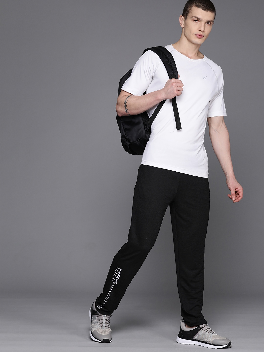 

HRX by Hrithik Roshan Men Solid Lifestyle Track Pants, Black