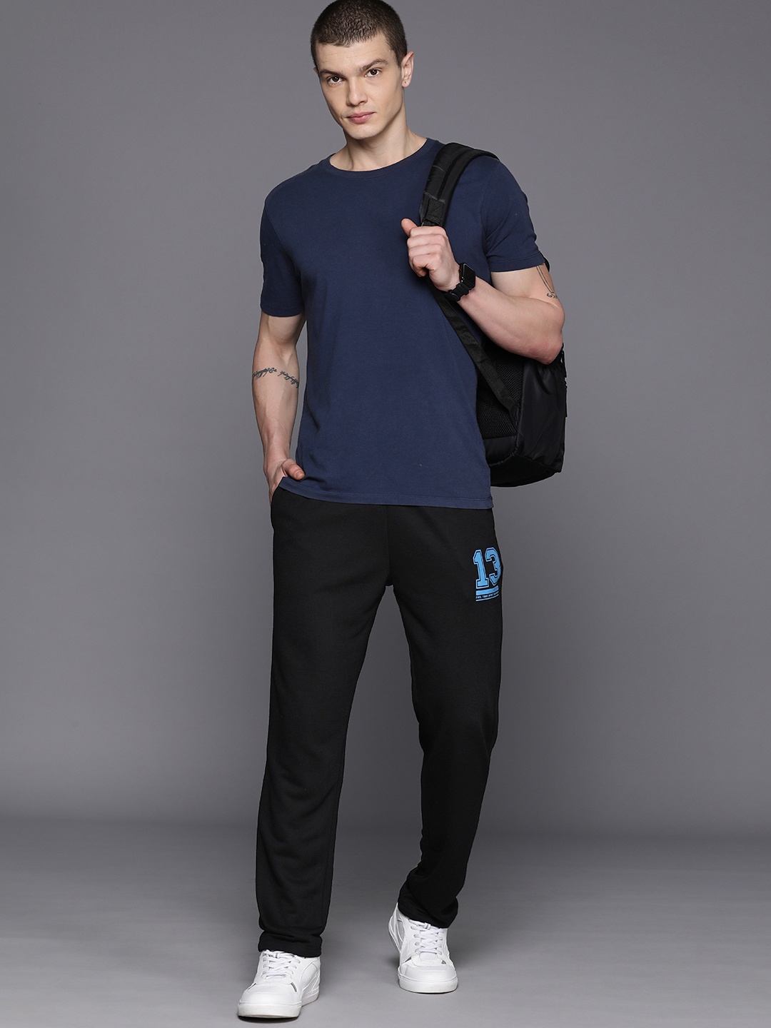 

HRX by Hrithik Roshan Men Solid Lifestyle Track Pants, Black