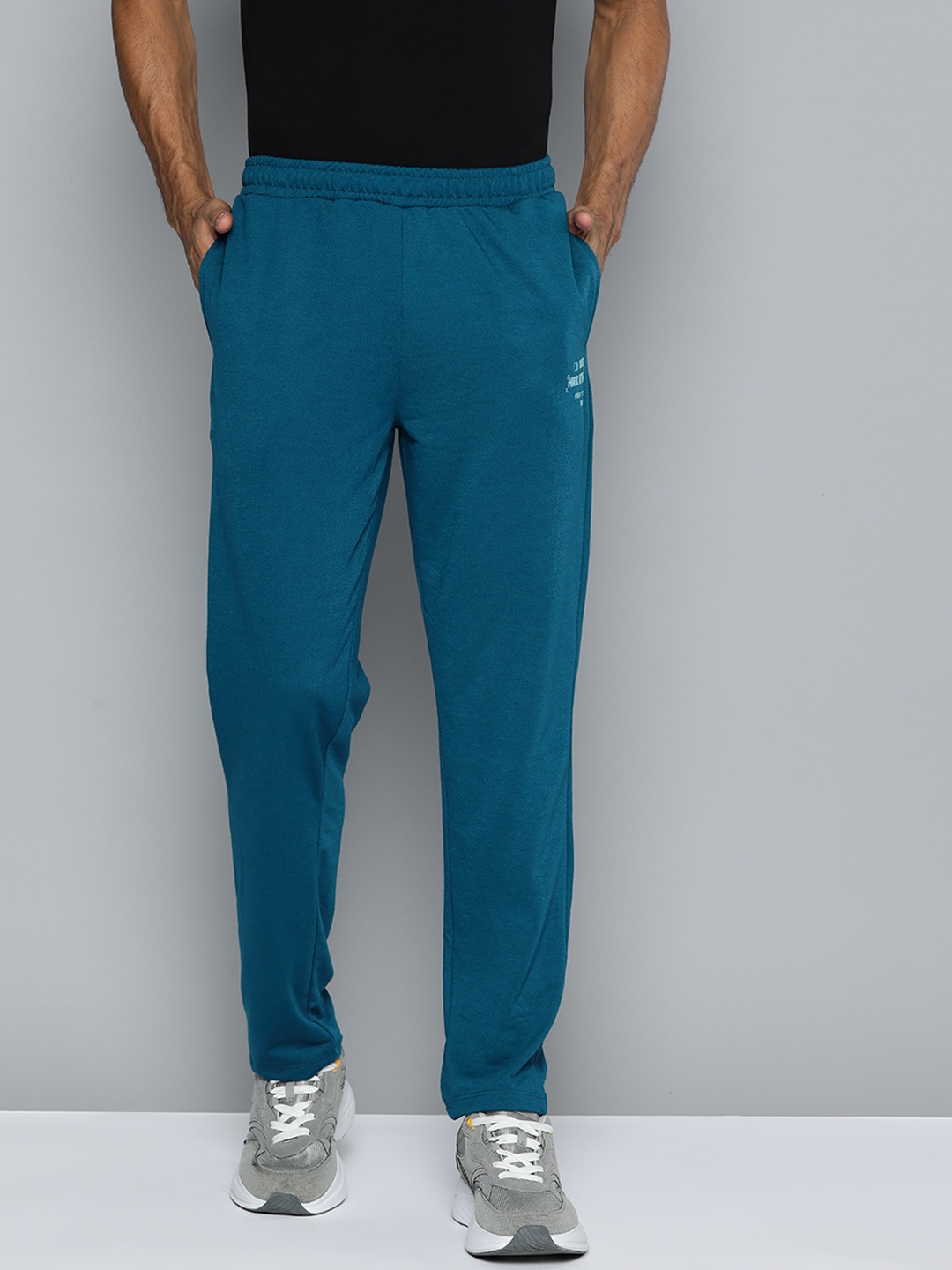 

HRX by Hrithik Roshan Men Solid Track Pants, Teal