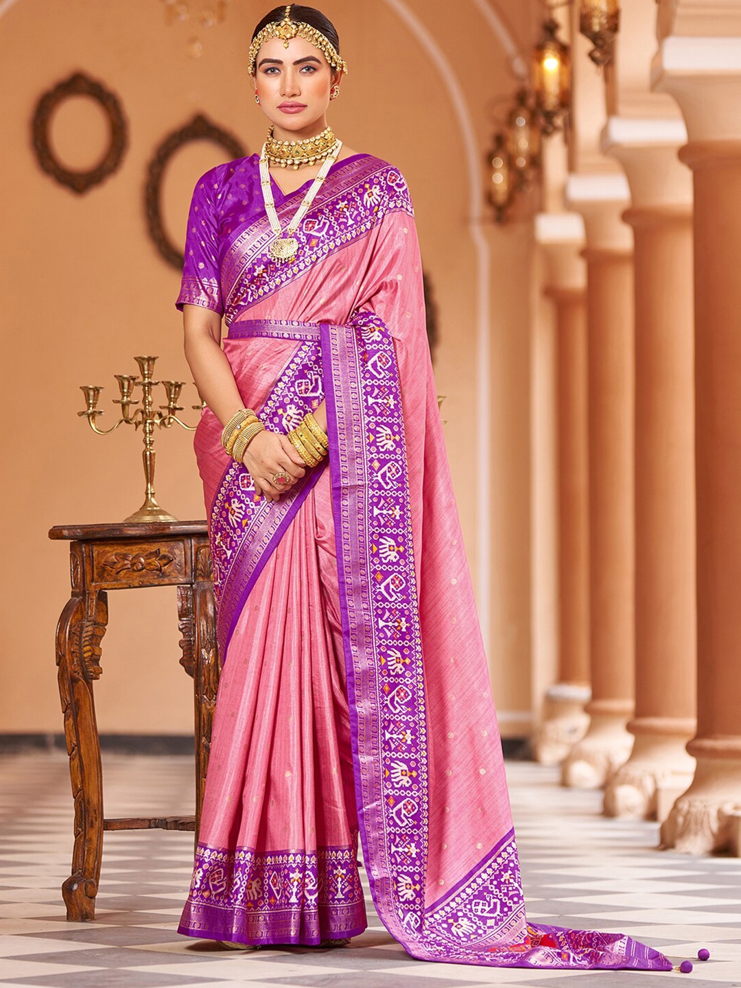 

Mitera Peach-Coloured & Purple Ethnic Motifs Printed Zari Saree