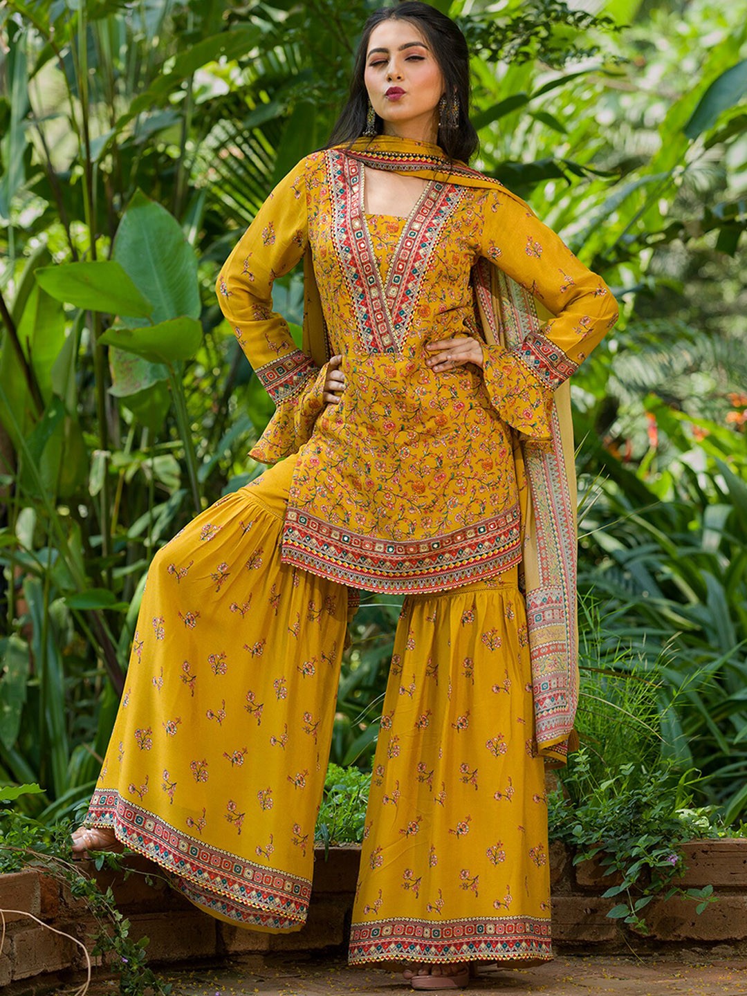 

Koskii Floral Printed Regular Sequined Kurta with Sharara & With Dupatta, Mustard
