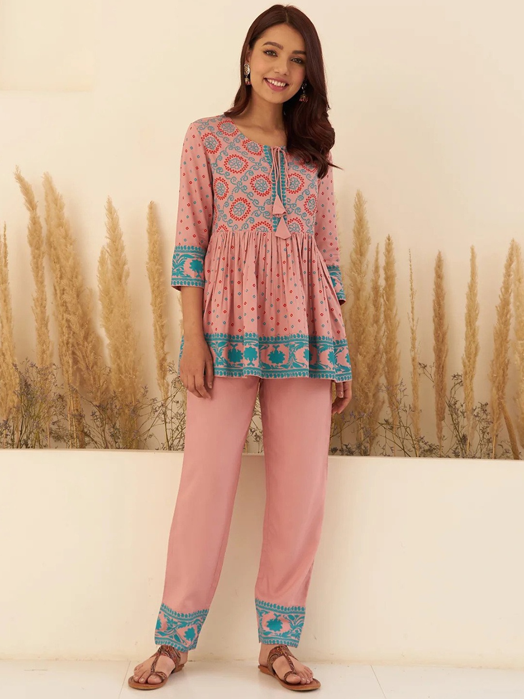 

KALINI Bandhani Ethnic Motifs Printed Empire A-Line Top with Trousers, Peach