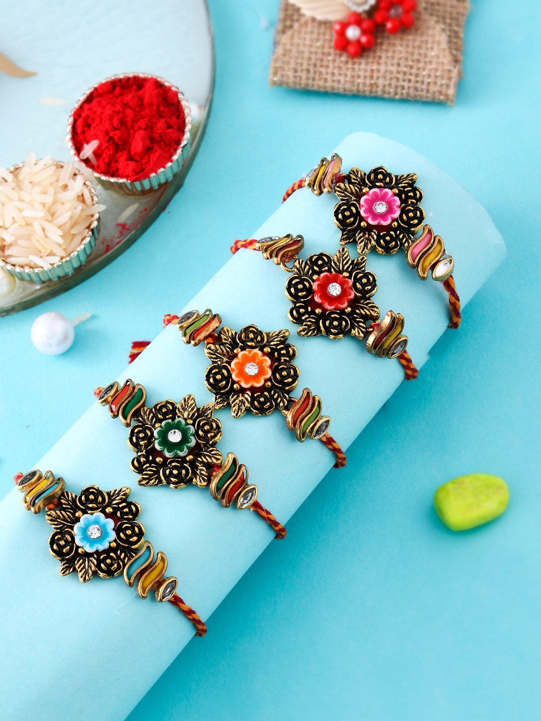 

Aapno Rajasthan Set of 5 Floral Engraved Royal Thread Rakhis, Gold