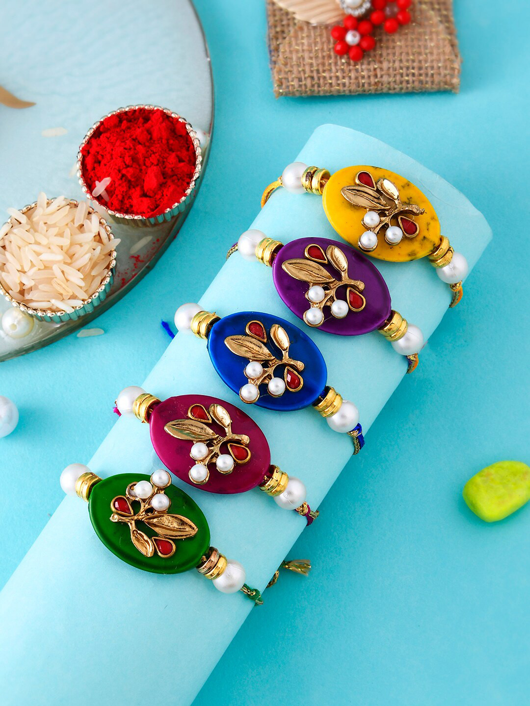 

Aapno Rajasthan Set of 5 Royal Rakhi With Roli Chawal & Greeting Card, Green