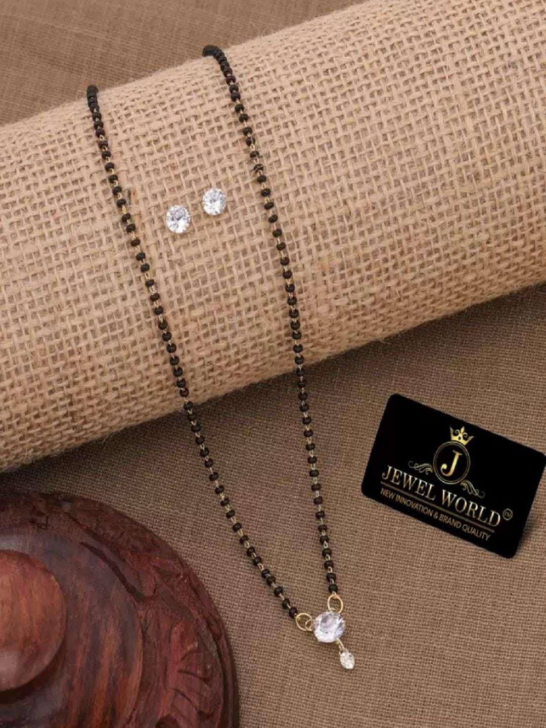 

JEWEL WORLD Gold-Plated Stone Studded & Beaded Mangalsutra With Earrings