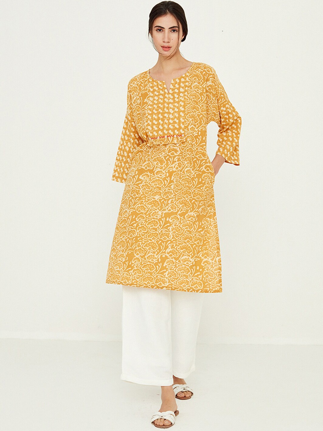 

Ancestry Floral Printed Flared Sleeves Thread Work Cotton Regular Kurta, Mustard