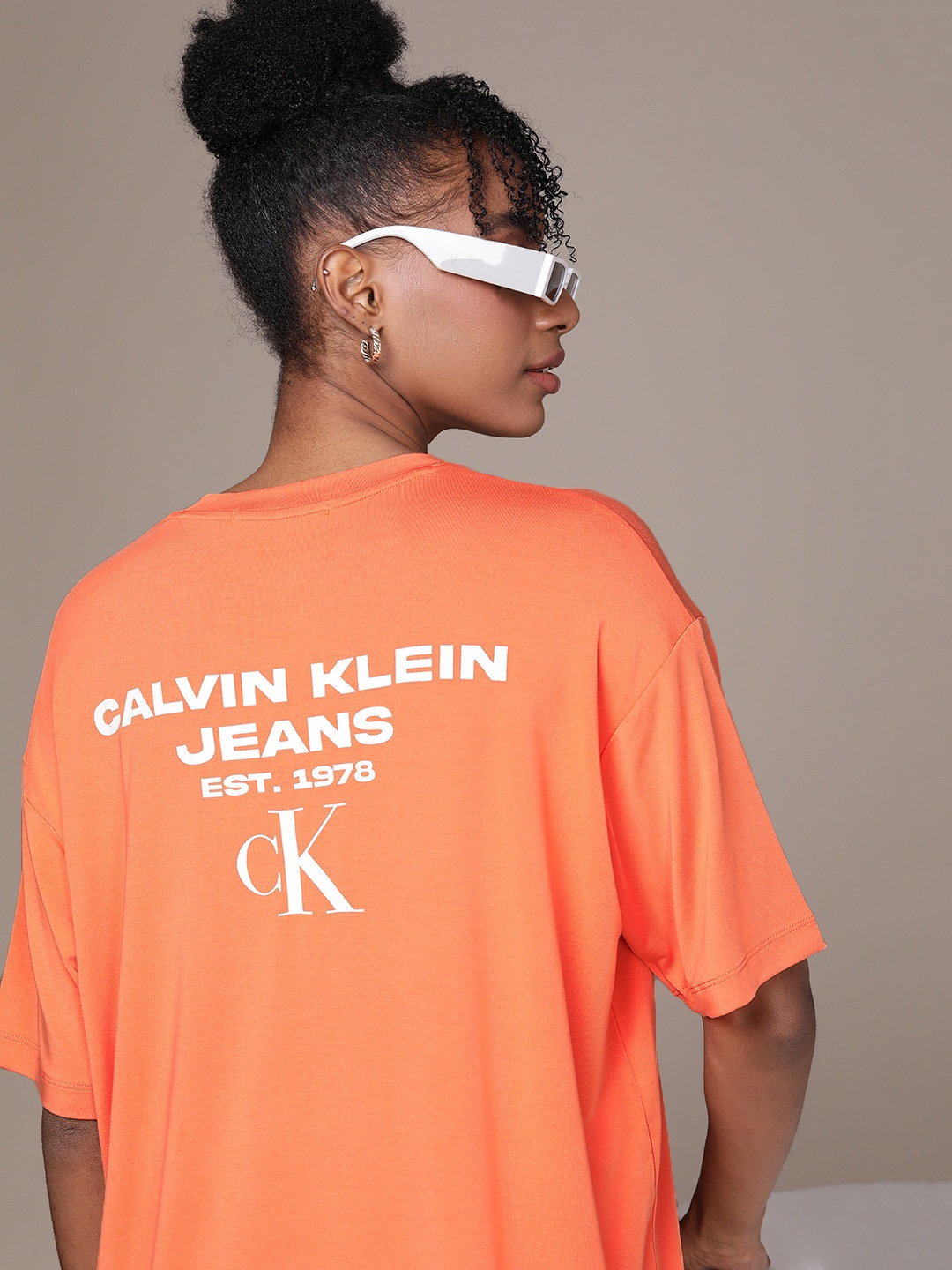 

Calvin Klein Jeans Brand Logo Printed Drop-Shoulder Sleeves T-shirt, Orange