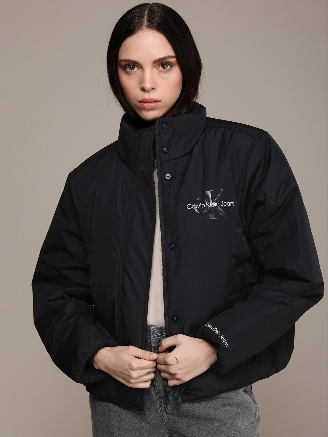 

Calvin Klein Jeans Mock Collar Padded Jacket With Minimal Brand Logo Print Detail, Black