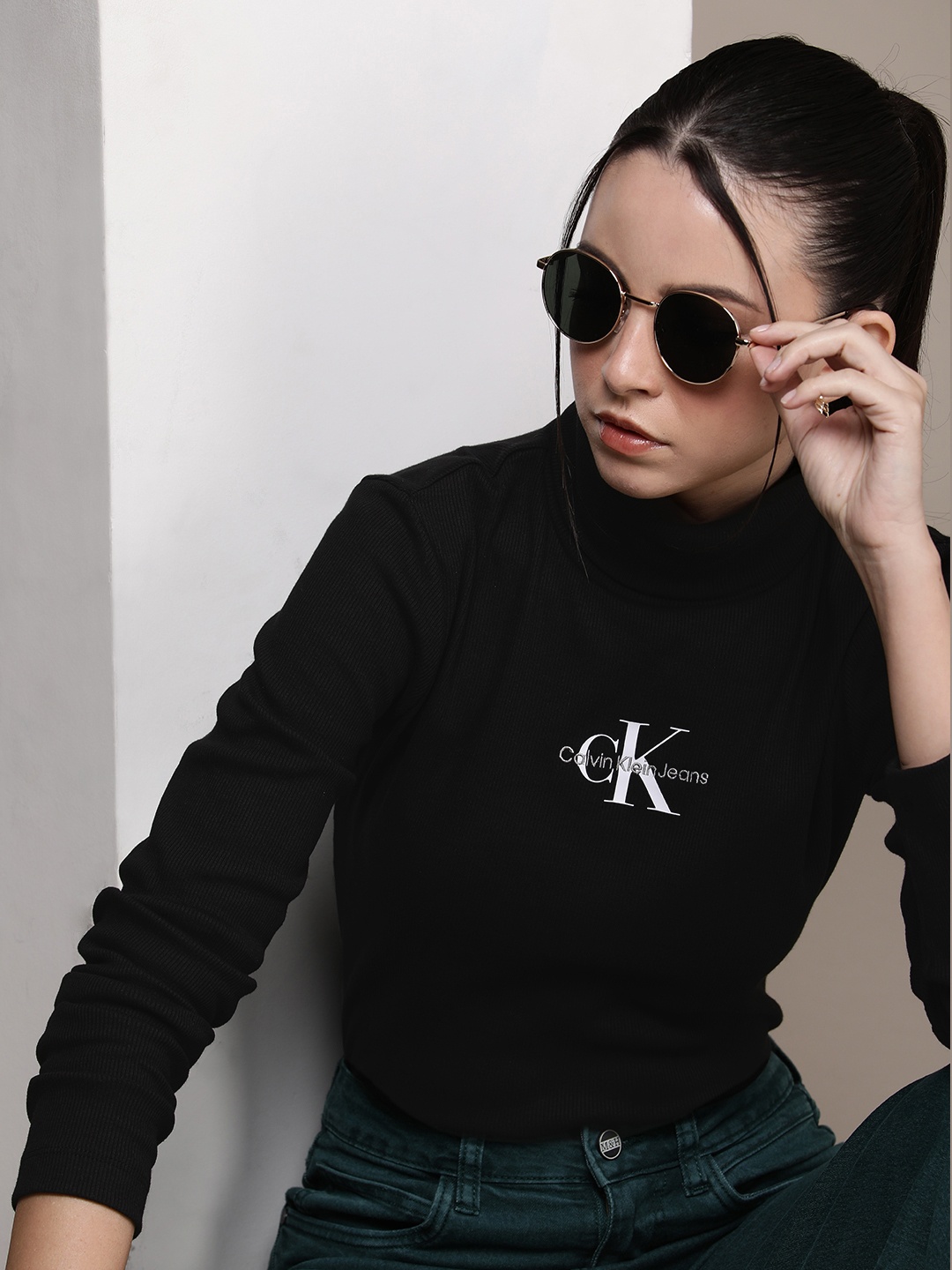

Calvin Klein Jeans Brand Logo Embroidered High-Neck Ribbed Top, Black