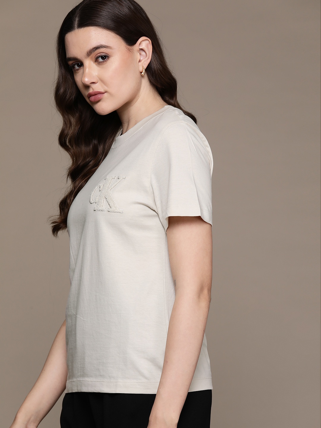

Calvin Klein Jeans Pure Cotton Applique T-shirt, Beige