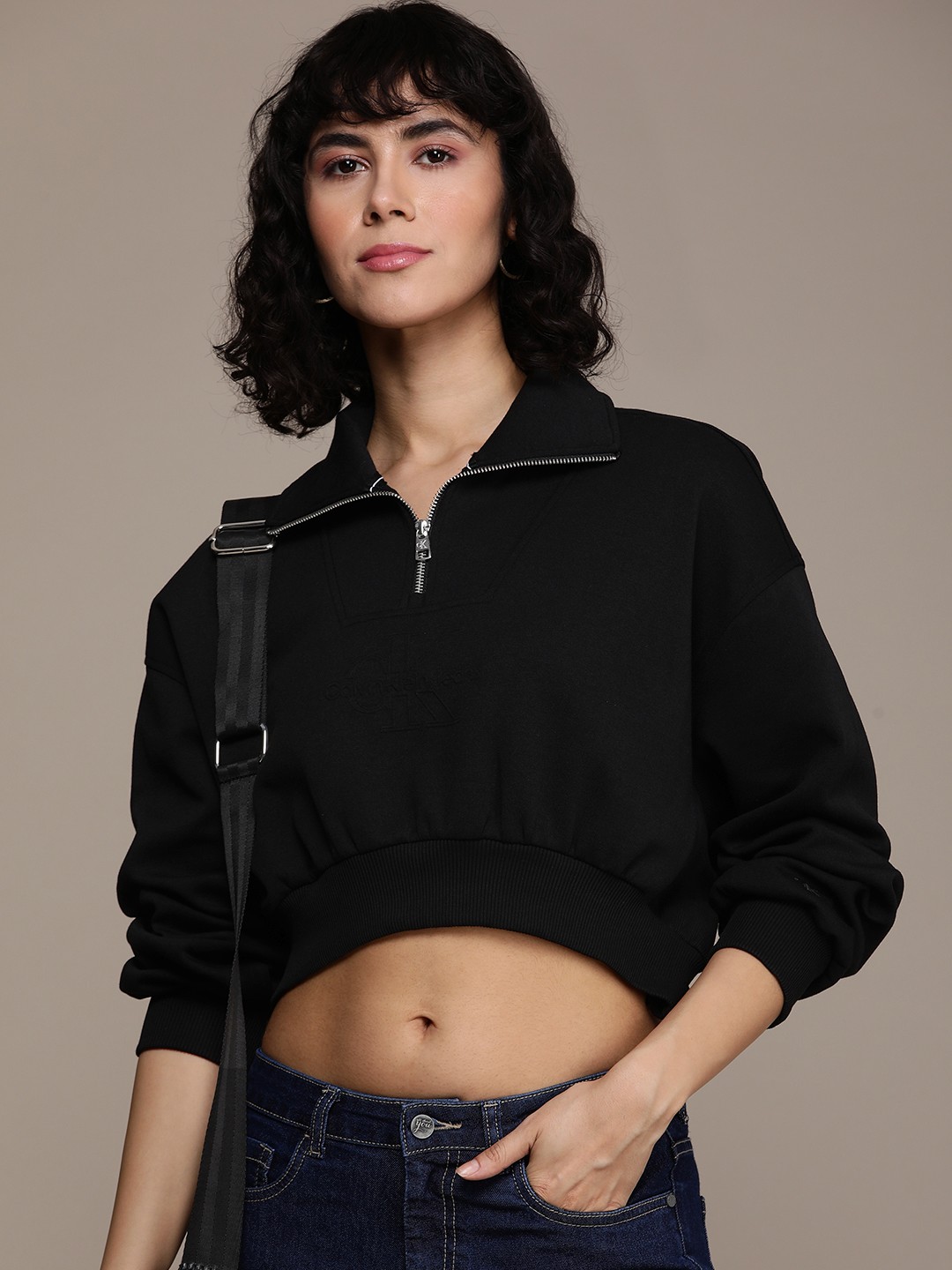 

Calvin Klein Jeans Brand Logo Embossed Half Zipper Crop Sweatshirt, Black
