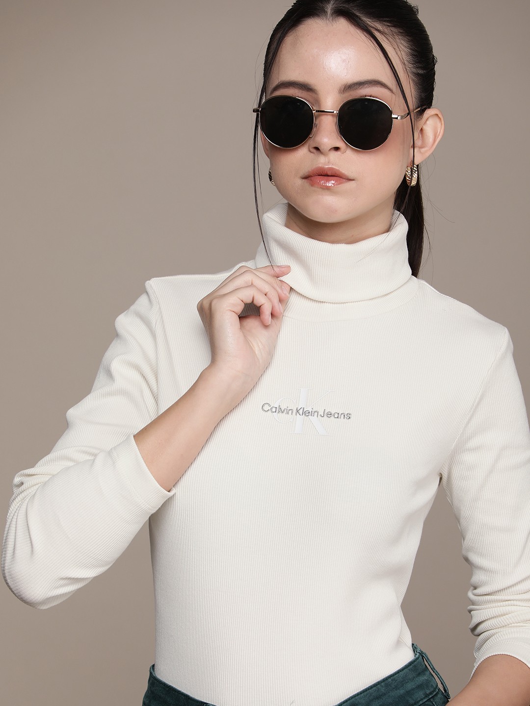 

Calvin Klein Jeans Brand Logo Embroidered High-Neck Ribbed Top, Beige