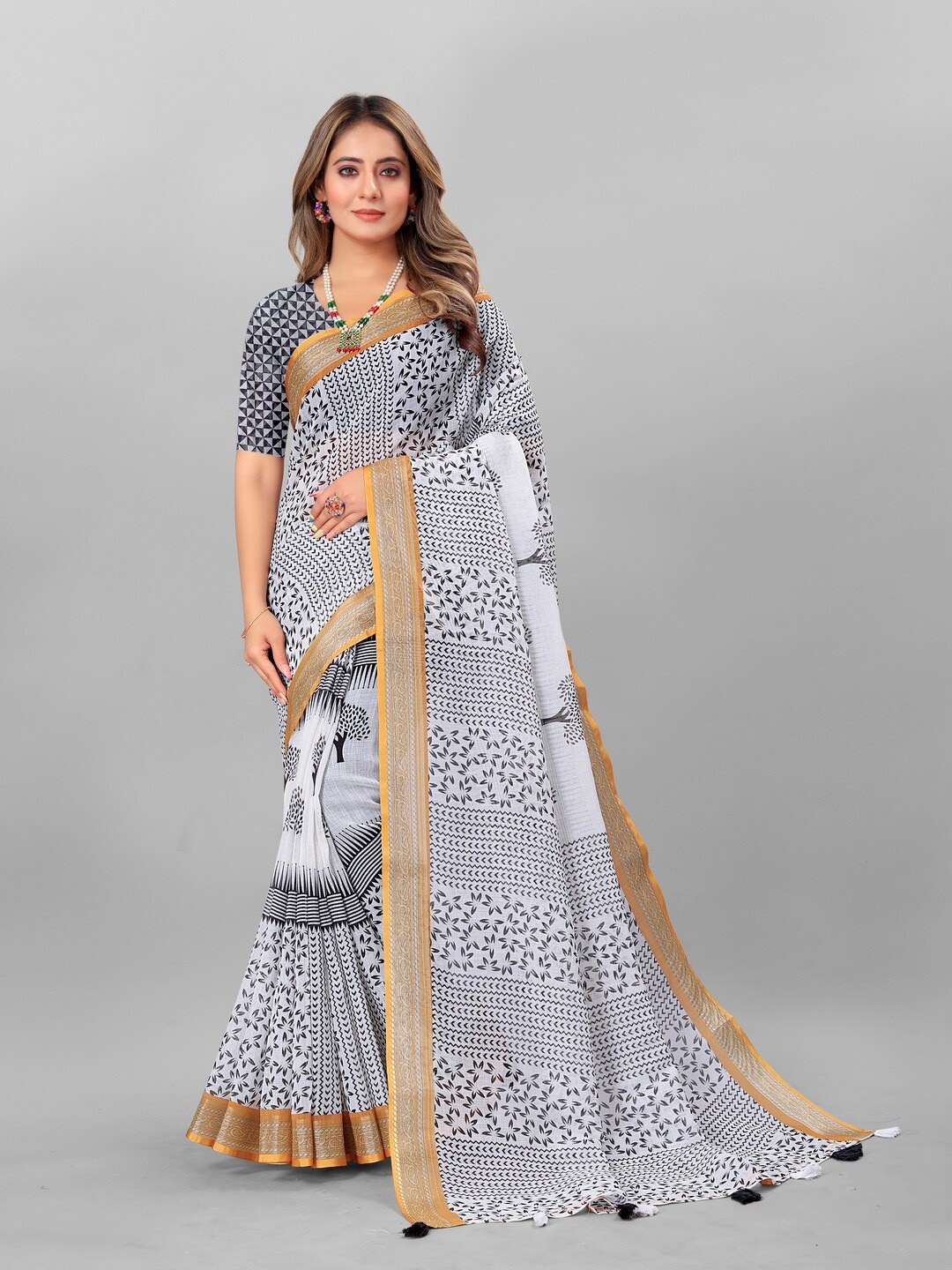 

Anouk Off White & Grey Ethnic Motifs Printed Zari Pure Linen Saree