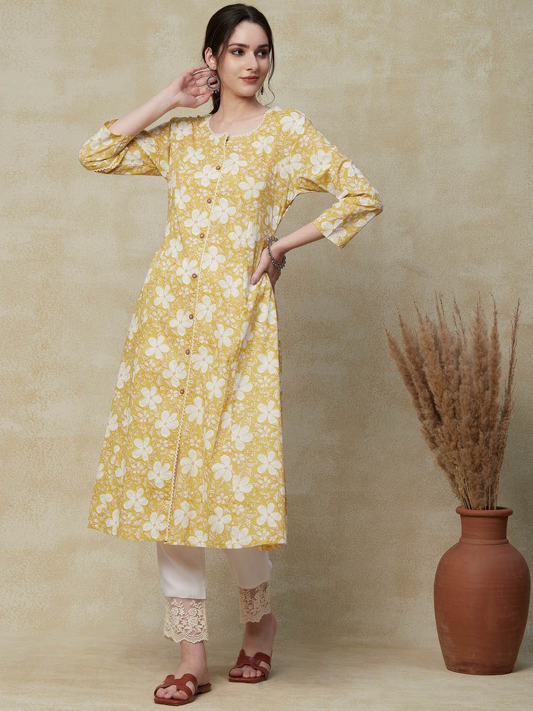 

FASHOR Yellow Floral Printed Round Neck Pure Cotton Thread Work A-Line Kurta