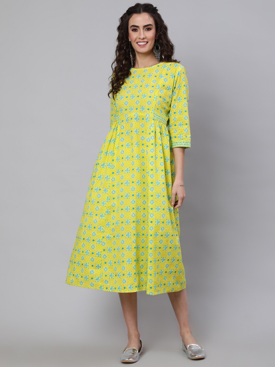 

Nayo Yellow Ethnic Motifs Printed Gathered Cotton Fit & Flare Ethnic Dress