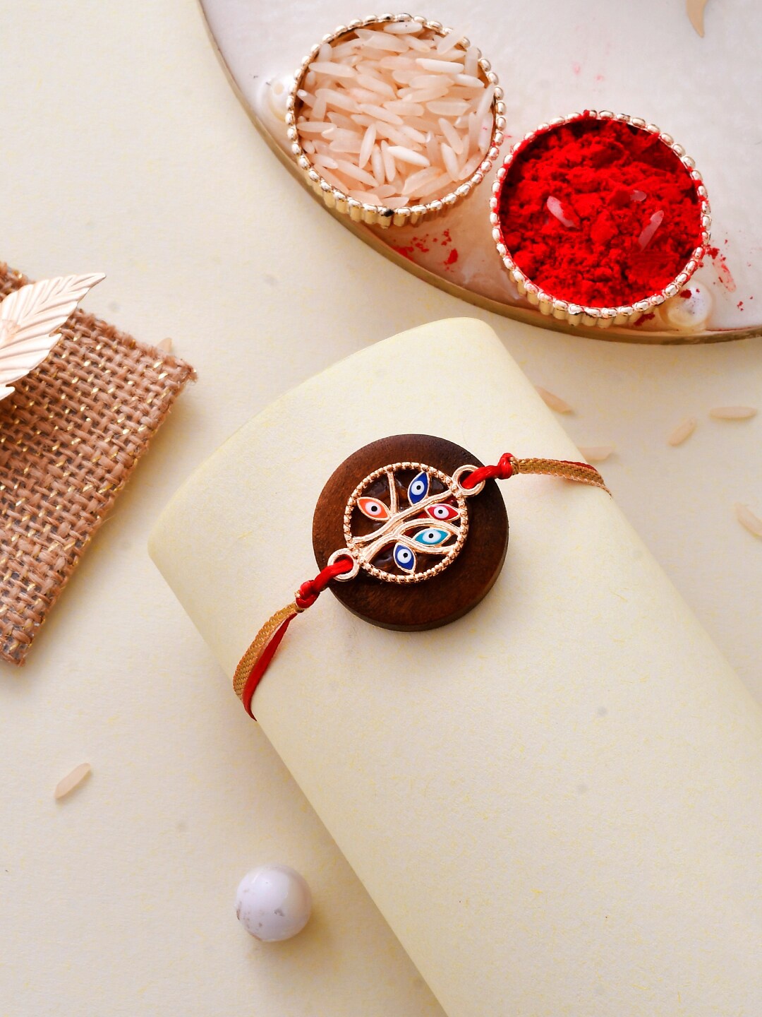 

Aapno Rajasthan Evil-Eye Resin Charm Rakhi, Brown