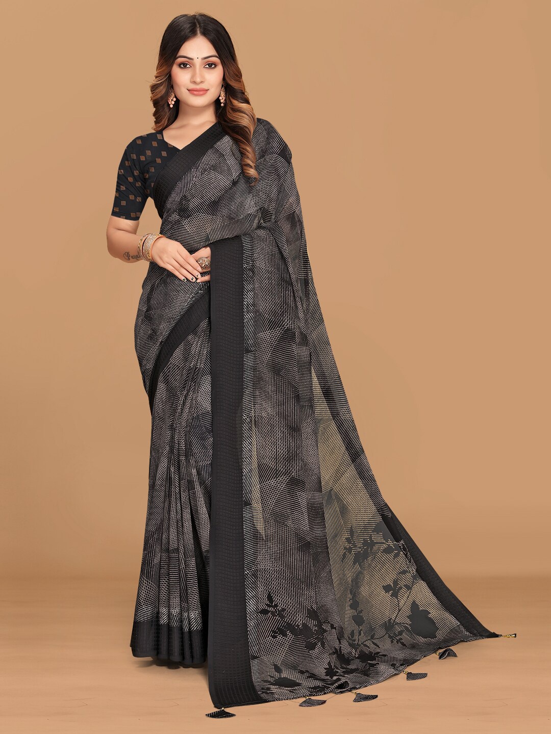 

Triveni Geometric Printed Woven Border Pure Georgette Saree, Black