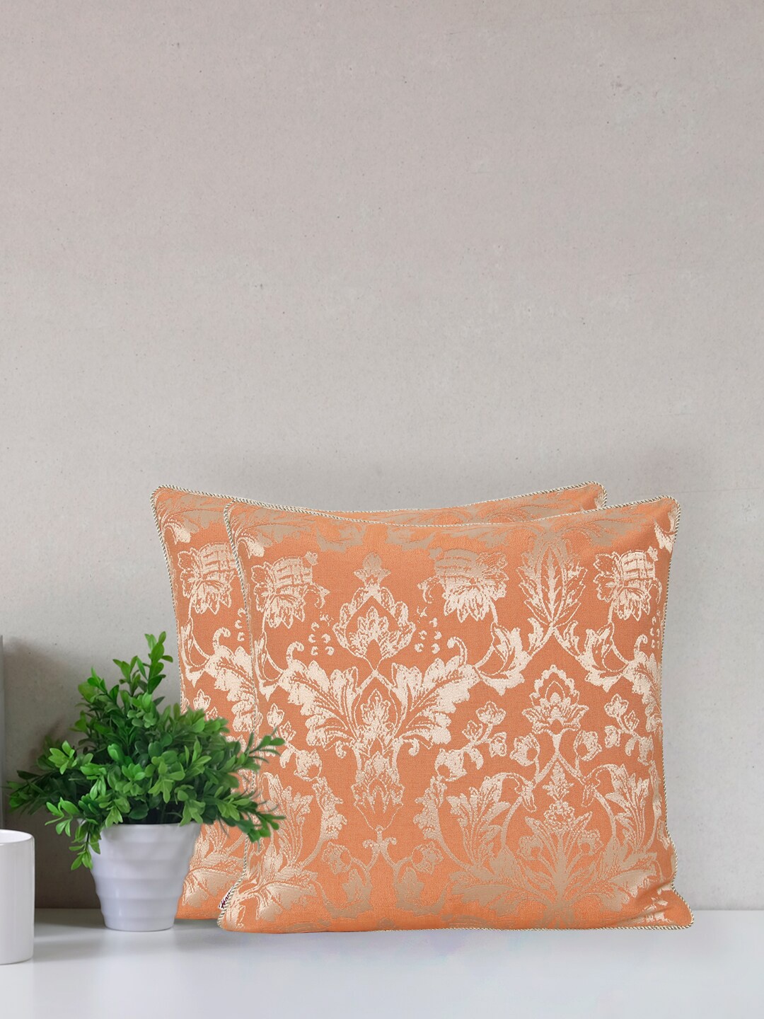 

Home Orange & Gold-Toned Ethnic Motifs Printed Jacquard Square Cushion Cover