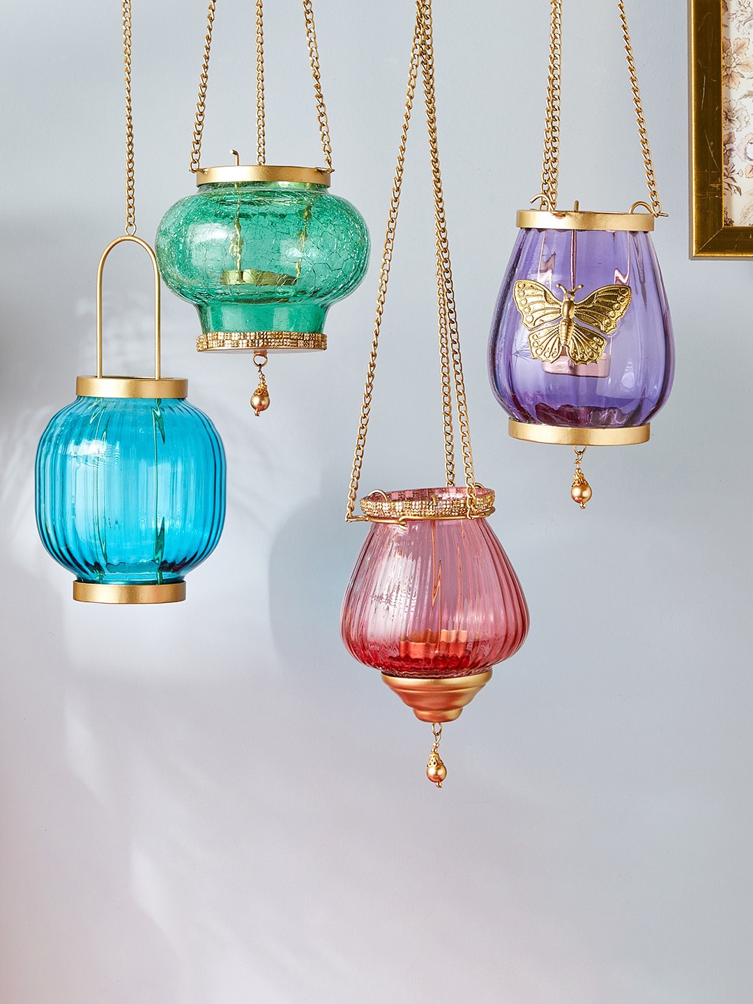 

Home Centre Pink Glass Drop Hanging T-light Holder