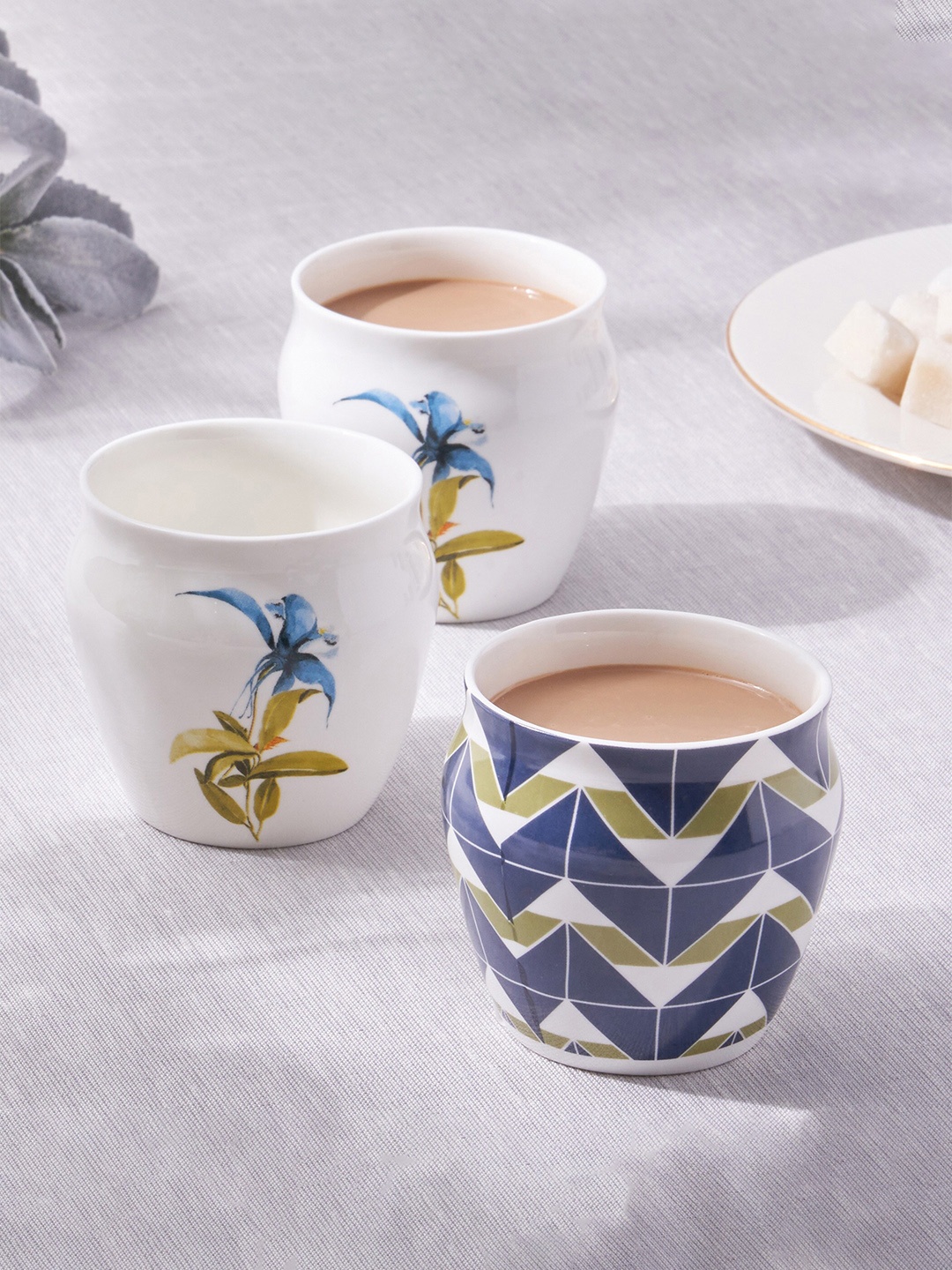 

Home Centre Mandarin Botanica White 3 Pcs Printed Bone China Glossy Kulladh - 240ml Each