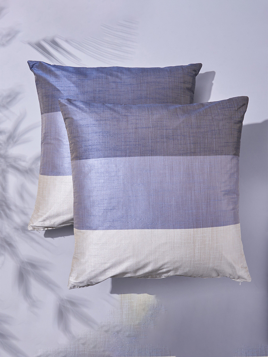 

Home Centre Wesley Grey & White 2 Pieces Colourblocked Square Cushion Covers