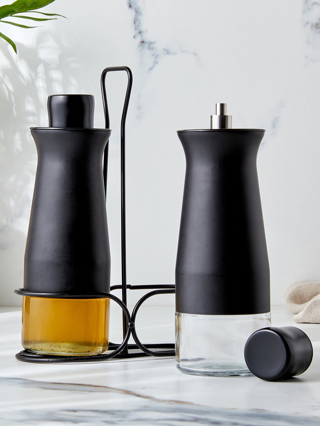 

Home Centre Chef Special Libra 2-Pcs Black Glass Oil Bottles with Metal Stand - 350 ML