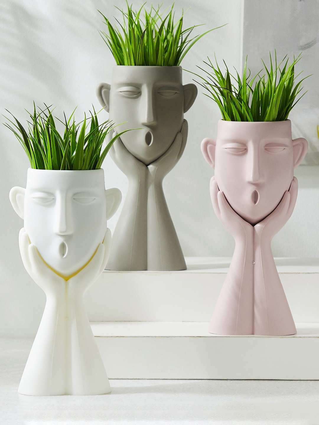 

Home Centre Spinel Decor White & Pink 3 Pieces Human Planters With Plant