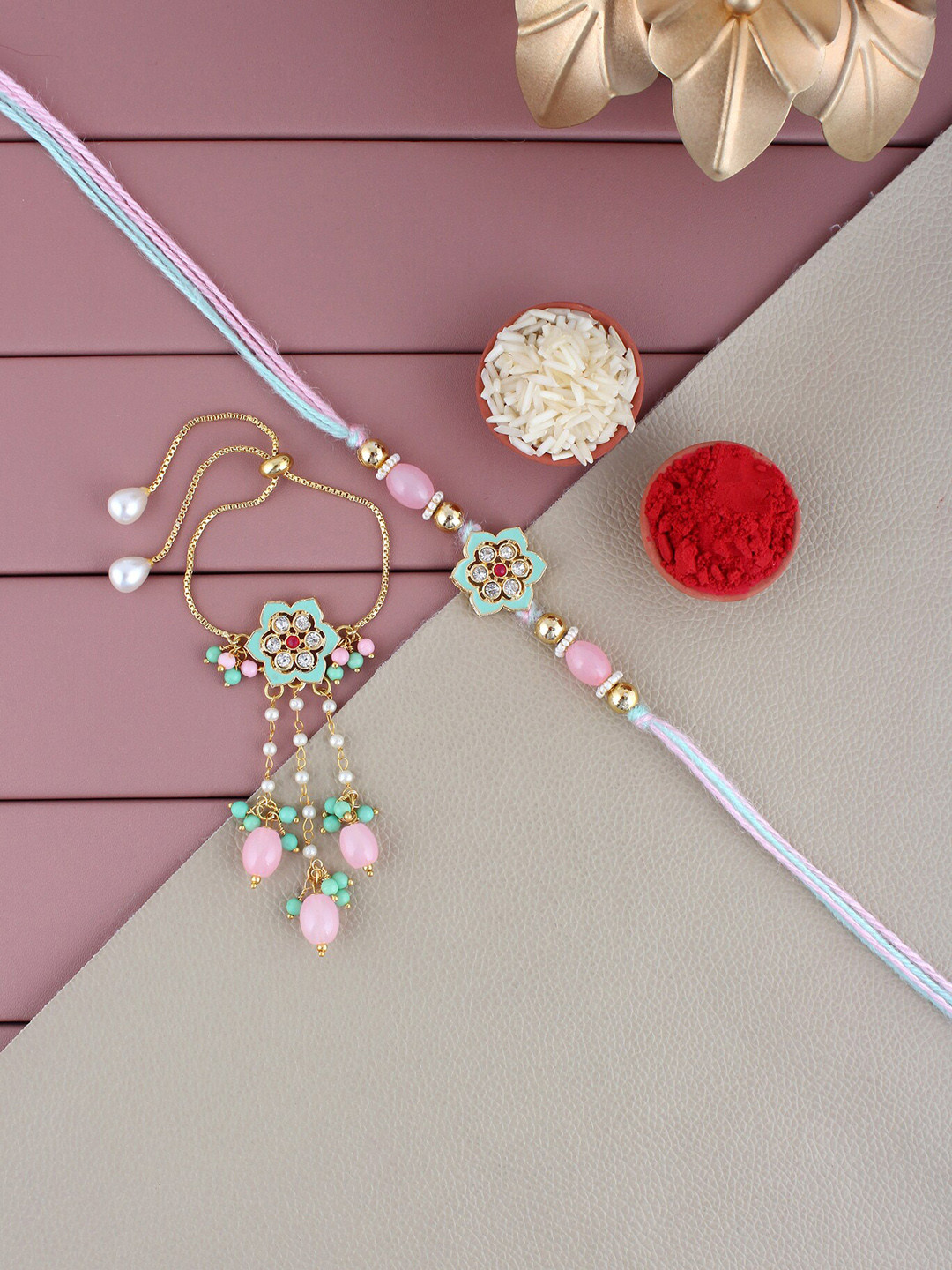 

LUCKY JEWELLERY Gold-Plated Stone-Studded Floral Rakhi with Lumba, Roli