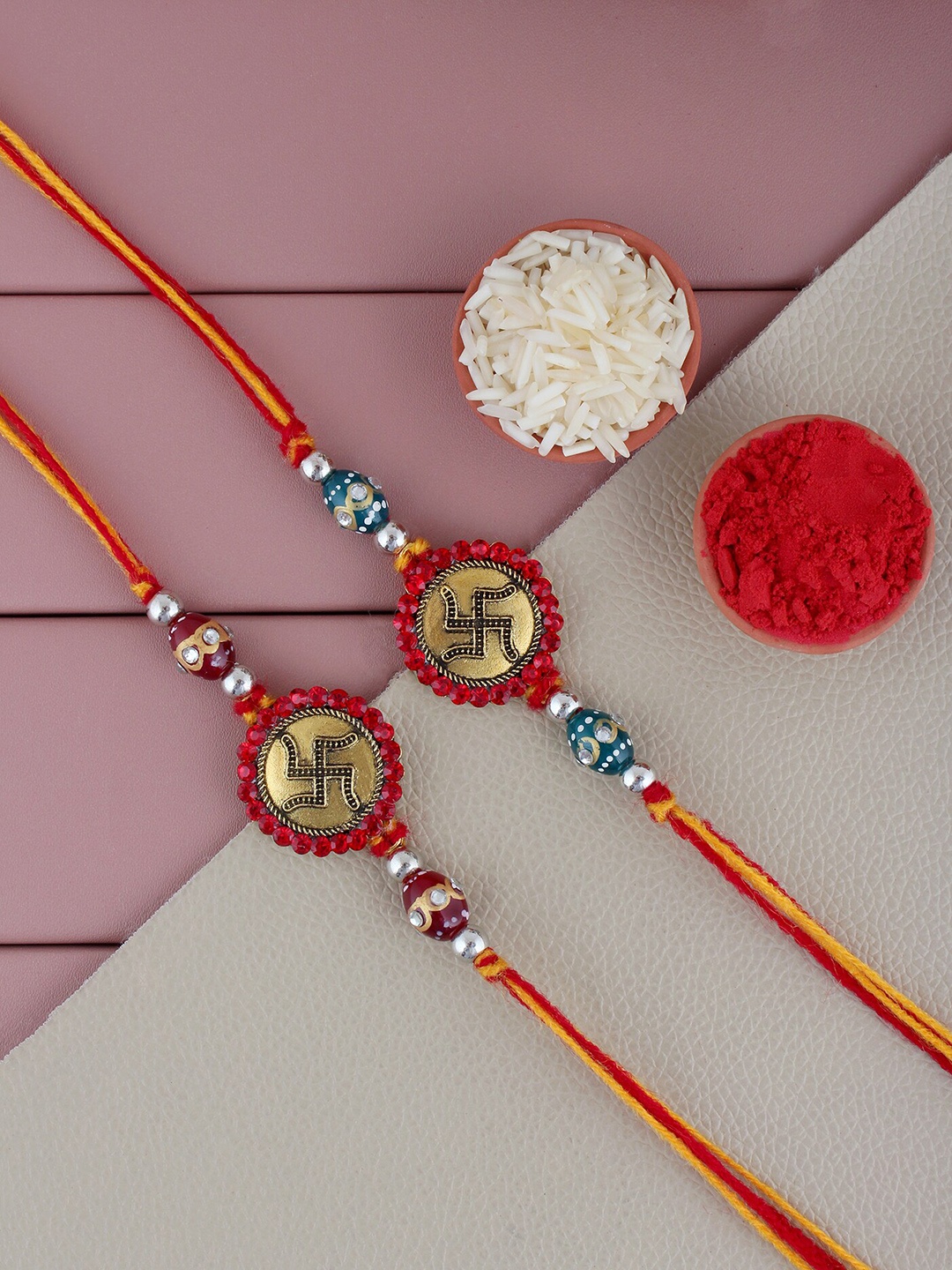 

LUCKY JEWELLERY Men Set Of 2 Gold-Plated Stone-Studded Swastik Charm Rakhis