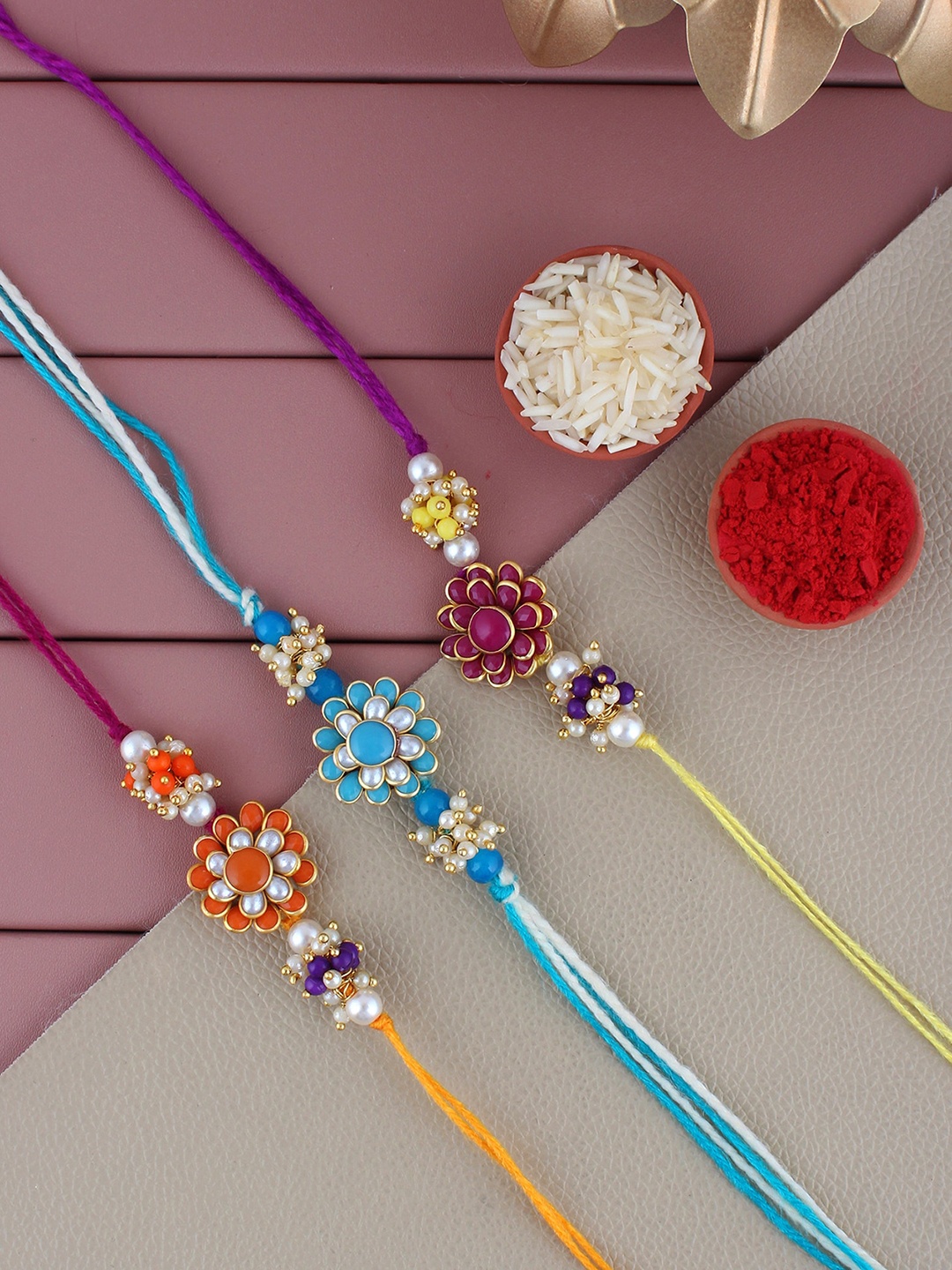 LUCKY JEWELLERY Set Of 3 Gold-Plated Stone-Studded Floral Charm Rakhis