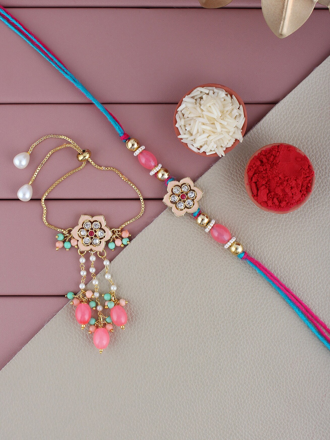 

LUCKY JEWELLERY Men Gold-Plated Beaded Floral Meena Rakhi with Lumba, Roli, Rice & Card