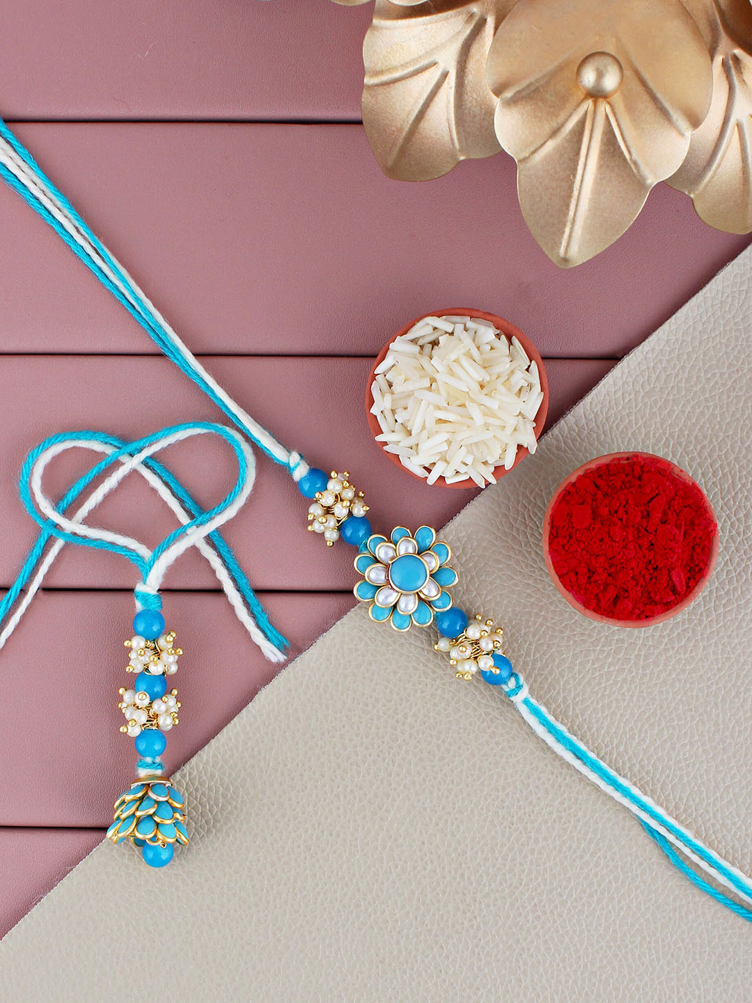 

LUCKY JEWELLERY Gold Plated Stone Studded & Beaded Rakhi Set