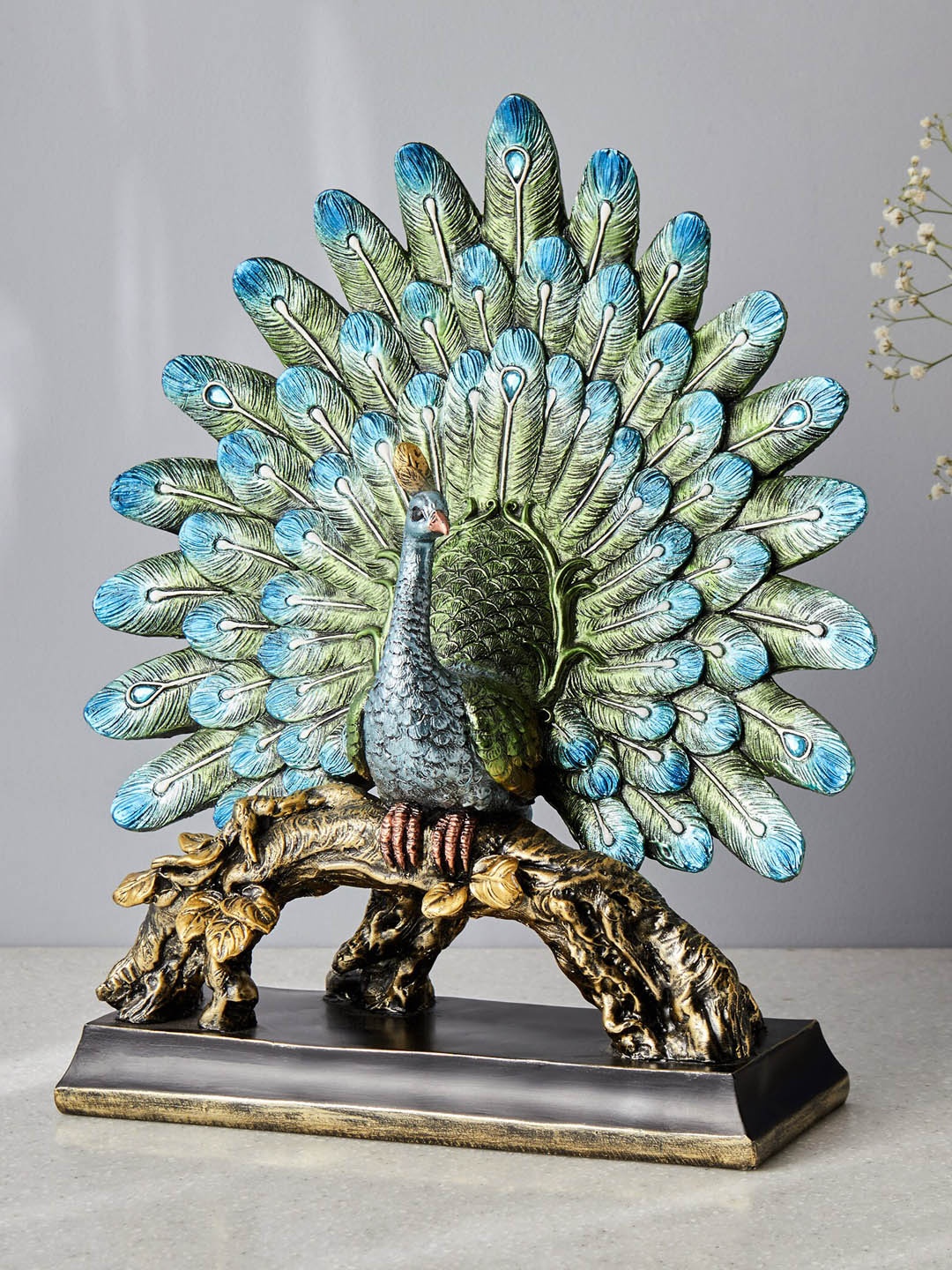 

Home Centre Mayur Blue & Black Peacock Table Accent Showpiece