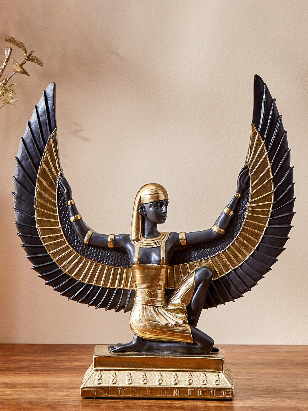 

Home Centre Jaguar Black & Gold Toned Egyptian Sitting Isis Figurine Showpiece