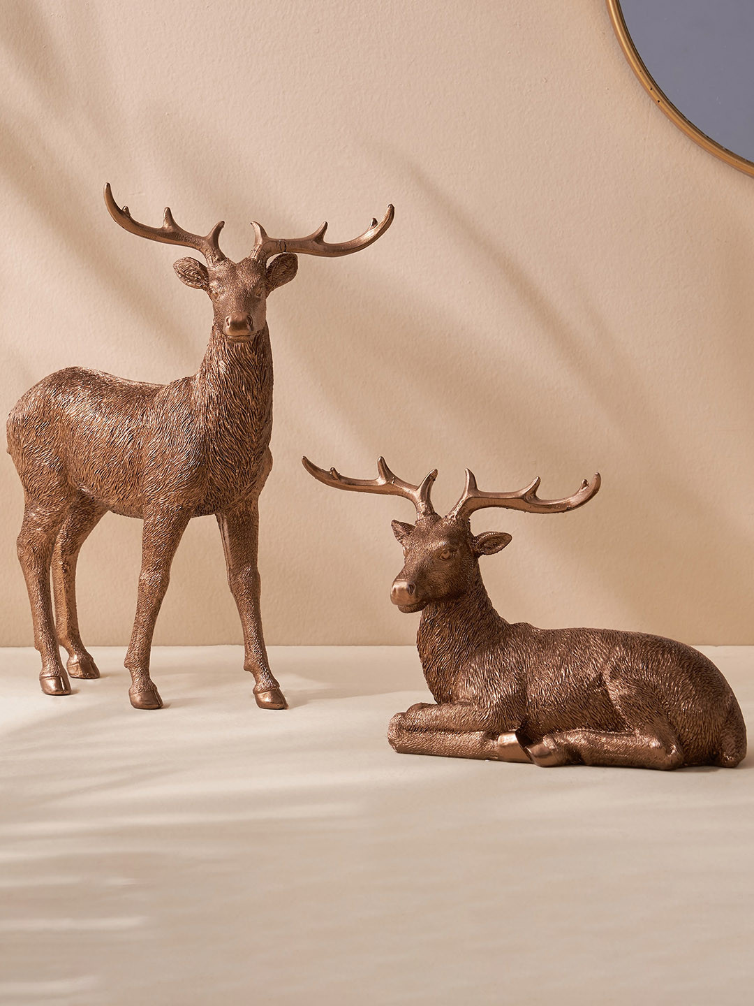 

Home Centre Mayur Brown 2 Pieces Reindeer Showpieces