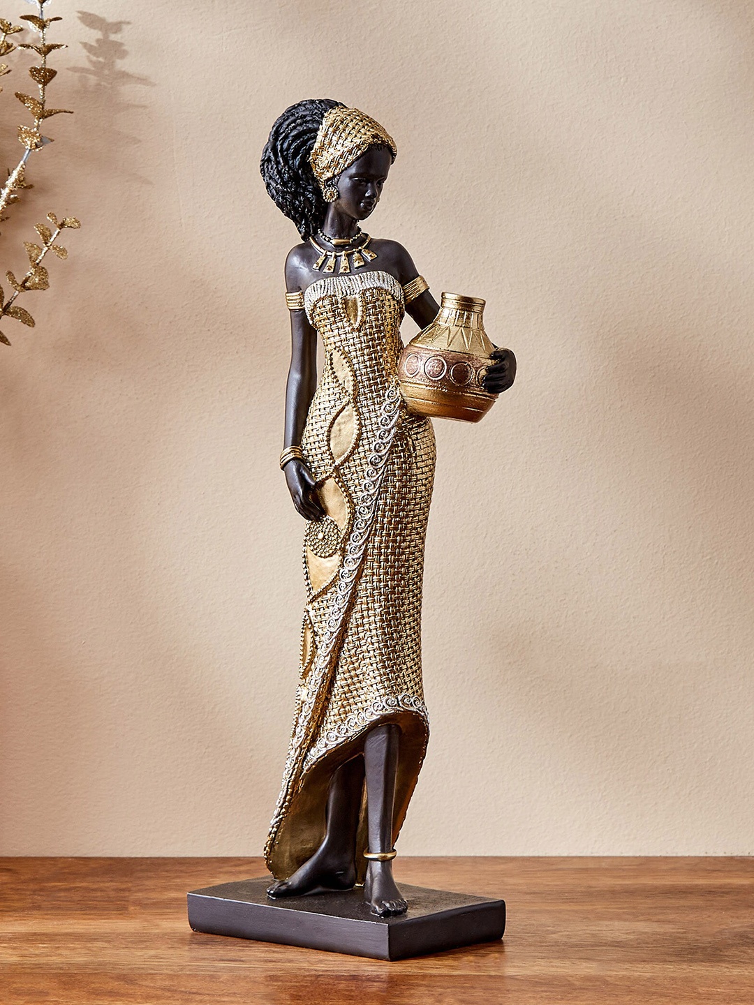 

Home Centre Jaguar Black Standing African Lady Showpieces