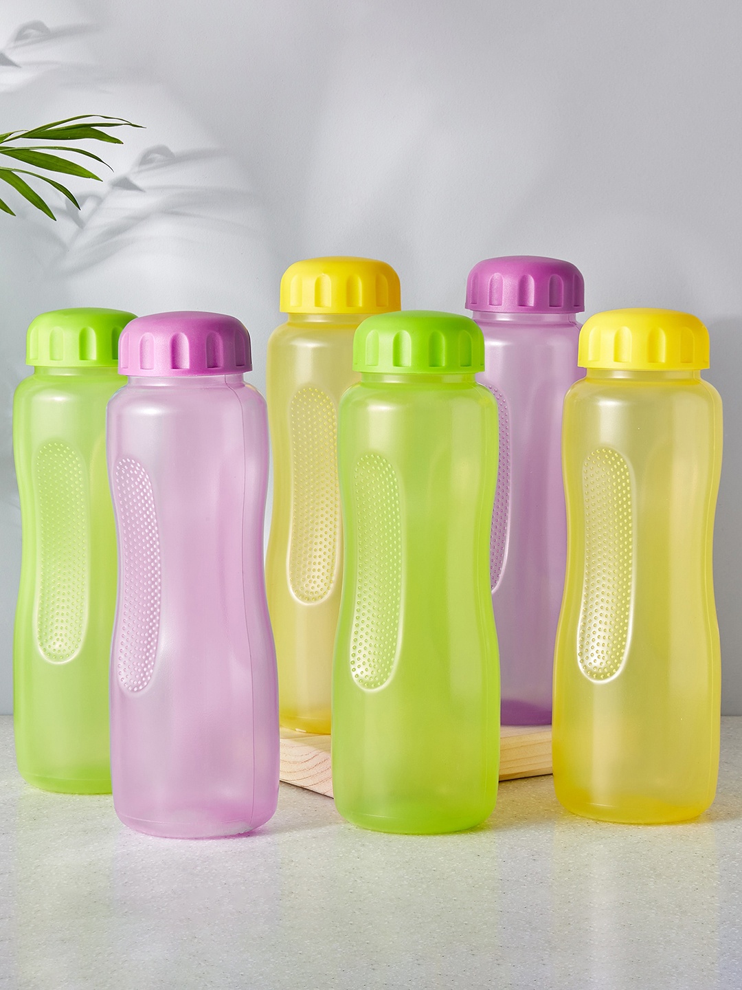 

Home Centre Marley Yellow & Green 6 Pieces Curvy Fridge Water Bottles 1 L Each