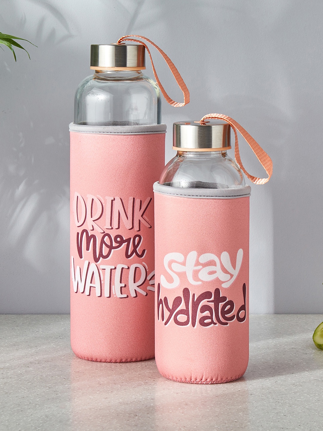

Home Centre Pacific Favola Transparent & Pink Glass Water Bottle With Pouch 400ml