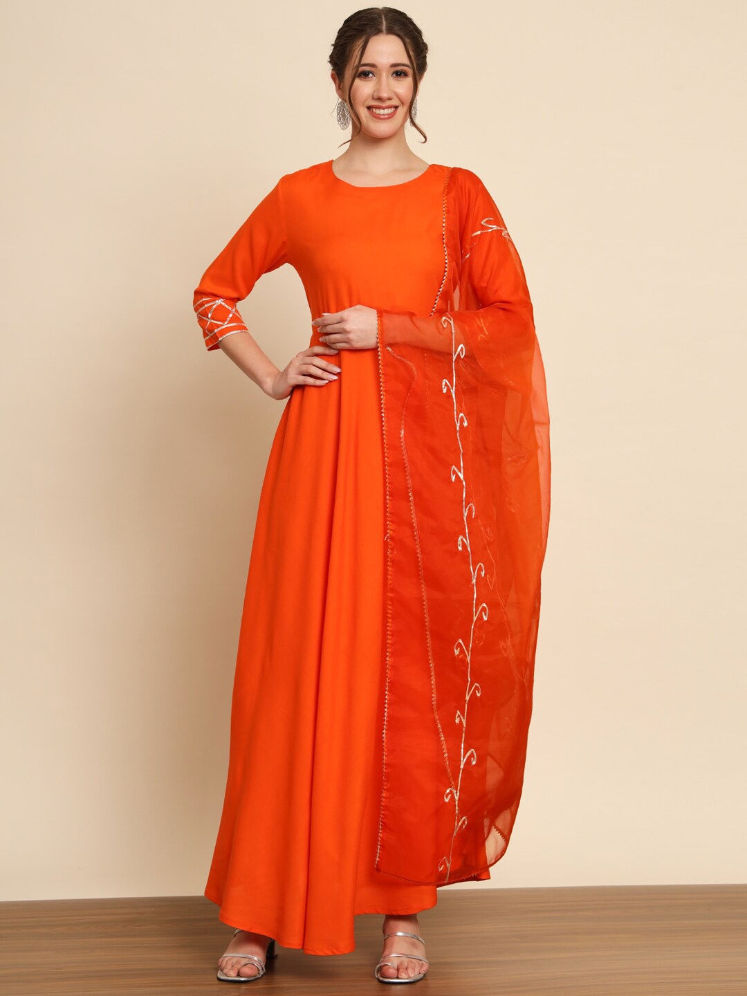 

Meeranshi Round Neck Anarkali Kurta With Trousers & Dupatta, Orange