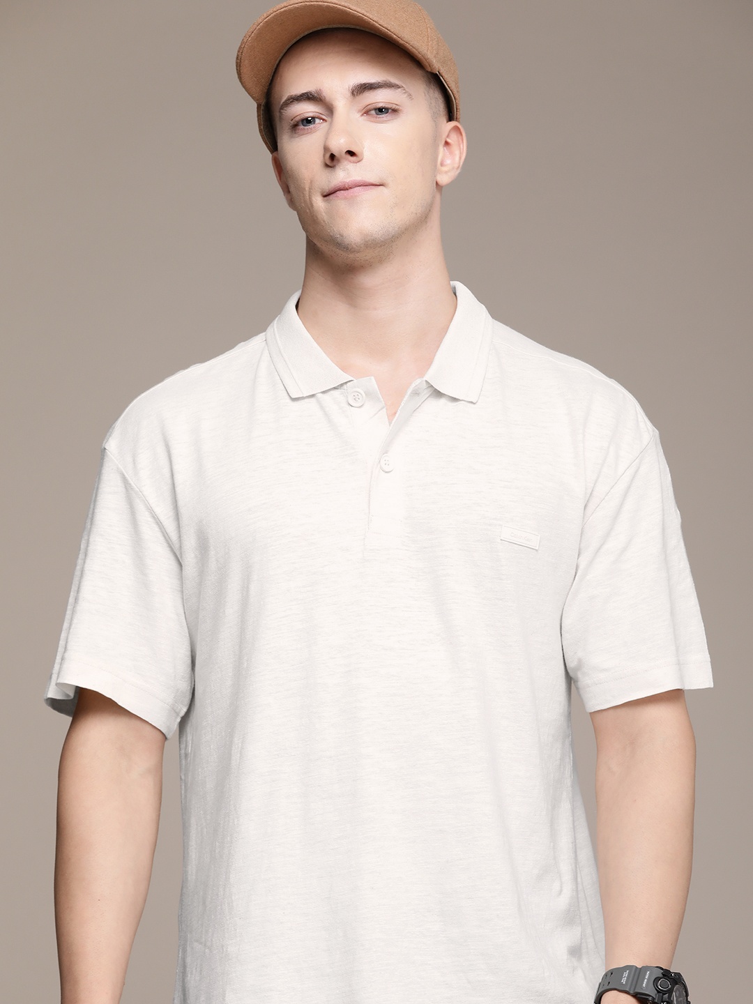 

Calvin Klein Jeans Solid Polo Collar Casual T-shirt, Off white