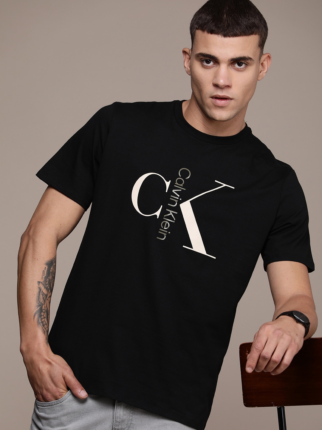

Calvin Klein Jeans Brand Logo Printed Pure Cotton T-shirt, Black